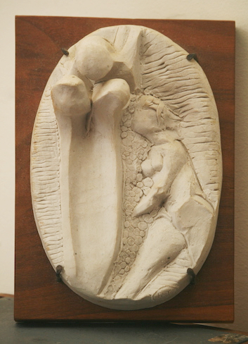 (figure of woman by 3 shapes - relief)