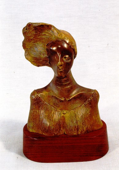 (bust of woman with blowing hair)