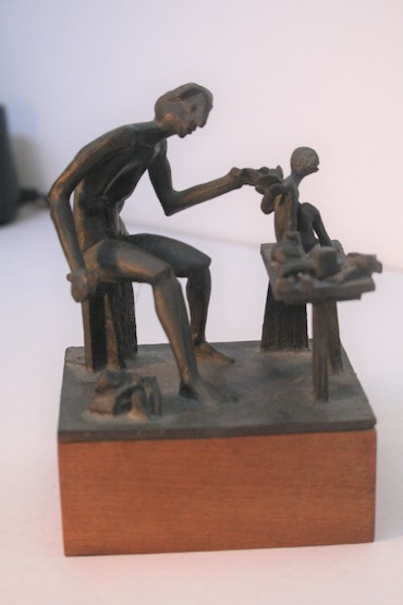 (Sculptor Working)